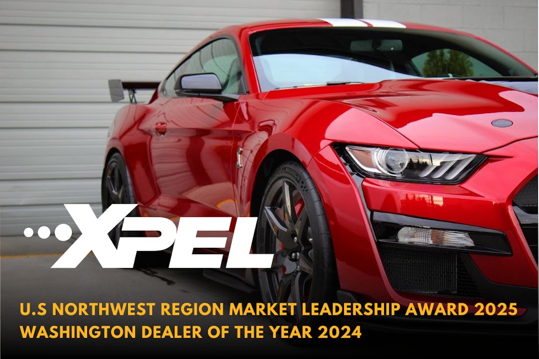 Red performance car protected with XPEL paint protection film by Benchmark Auto Salon