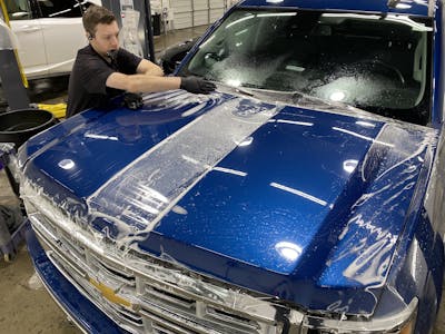 Applying clear paint protection to a pickup