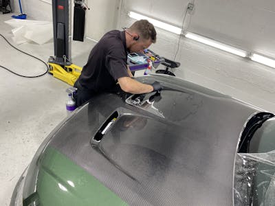 Applying clear paint protection to car hood