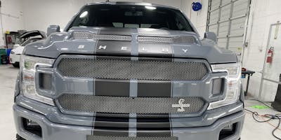Grey Ford Shelby F150 pickup truck