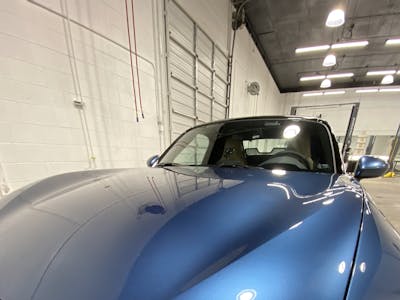 Custom paint coating on a blue car