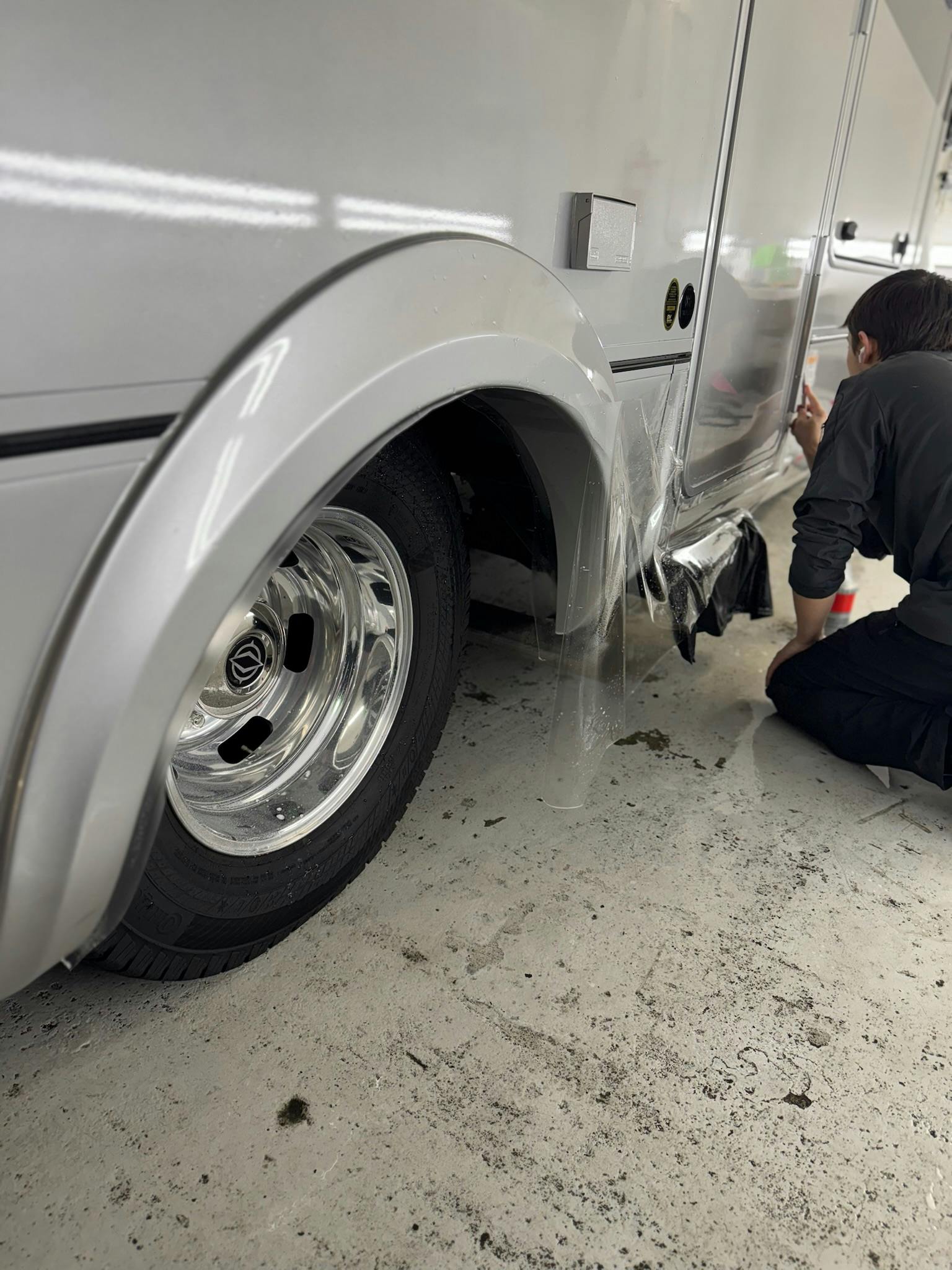 Finished RV wheel arch and rocker panel protected with XPEL film