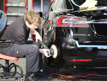 Tesla Model S receiving polish work to remove imperfections before applying our ceramic coating